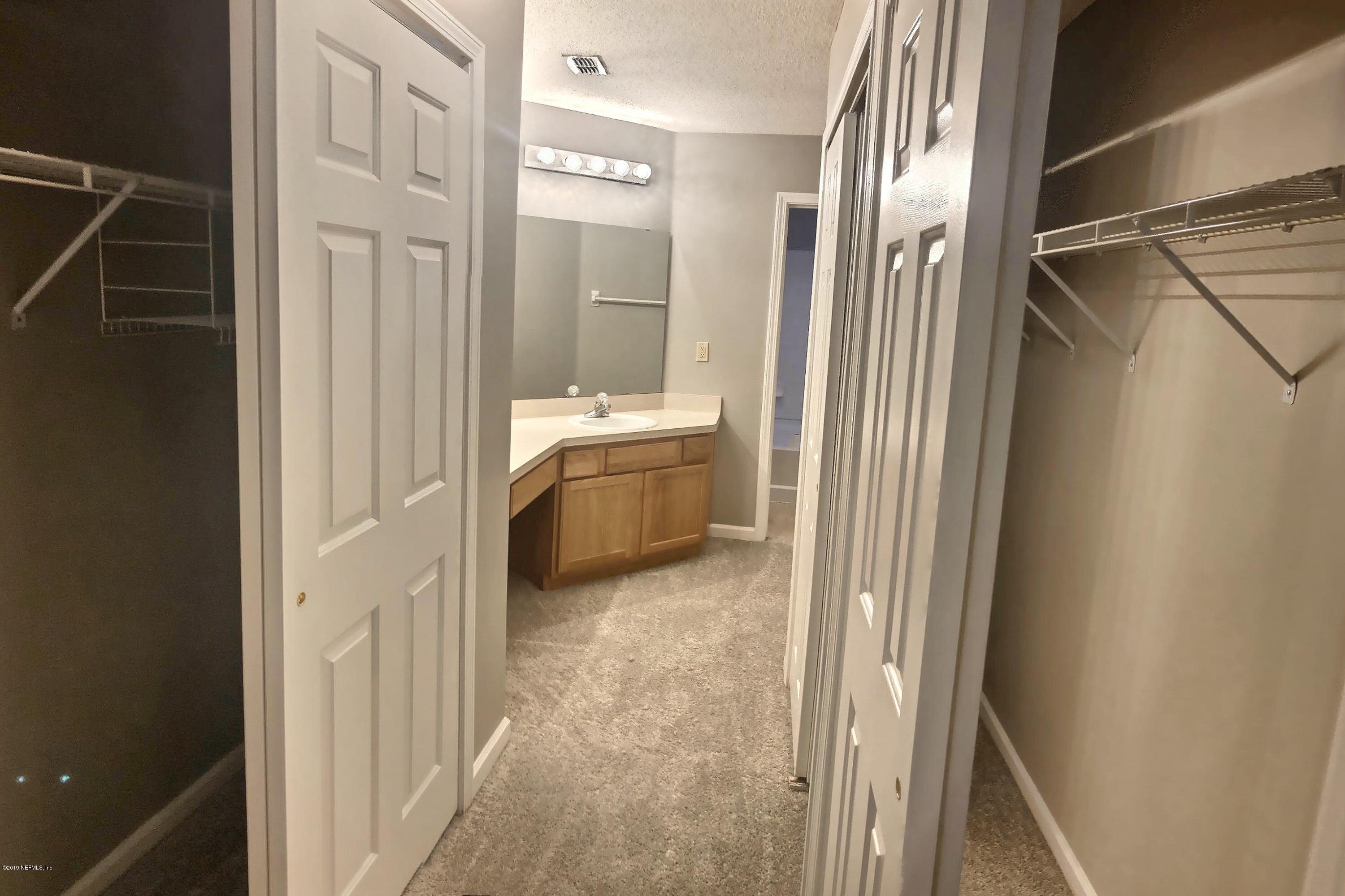 96023 Coral Reef Road Yulee, FL 32097 - Photo 17 of 23 Master Closets and Vanity