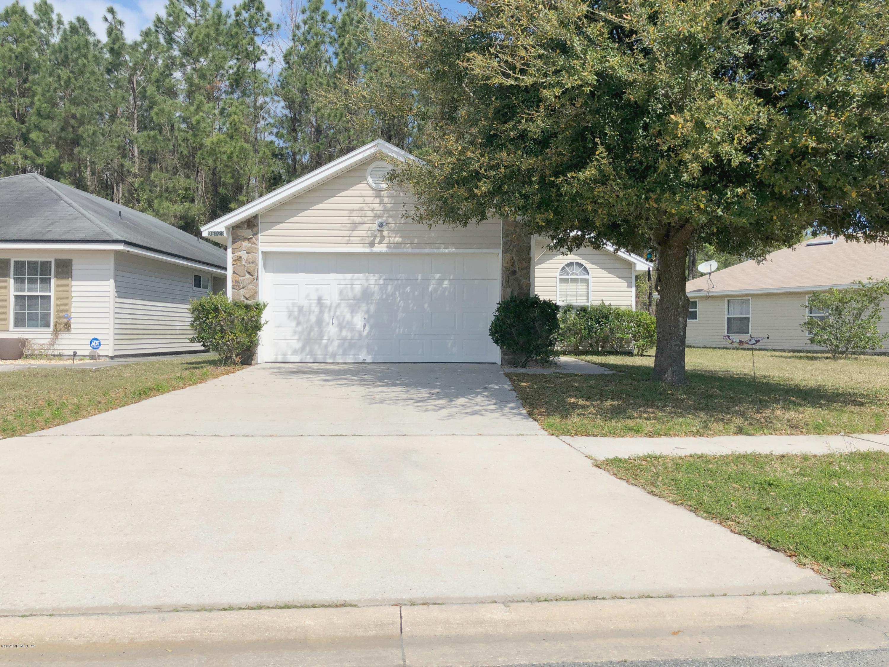 96023 Coral Reef Road Yulee, FL 32097 - Photo 5 of 23 Garage Door