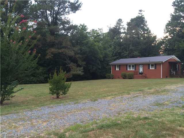 6175 Lanes Mill Road Ramseur, NC 27316 - Photo 3 of 12 Exterior Front. Large yard ready for your family!