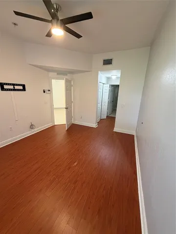 a bathroom with a shower a toilet and a sink