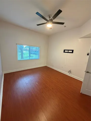 a bathroom with a double vanity sink toilet and shower