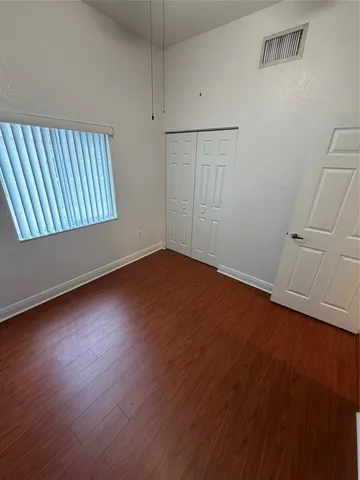 a bathroom with a bathtub and toilet