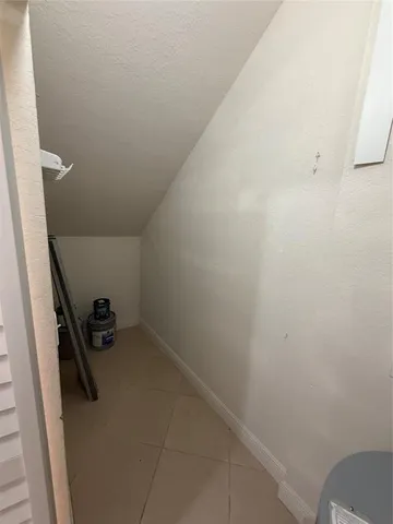 a childrens park with lots of swings and slides