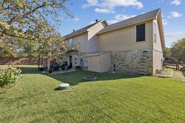 a house view with a garden space