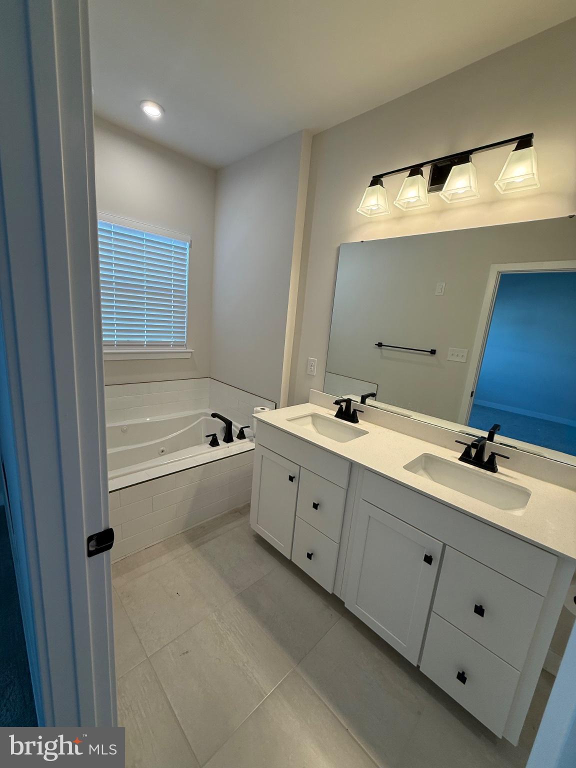 3 Cinnamon Lane Mount Laurel, NJ 08054 - Photo 15 of 27 a bathroom with a double vanity sink mirror and bathtub