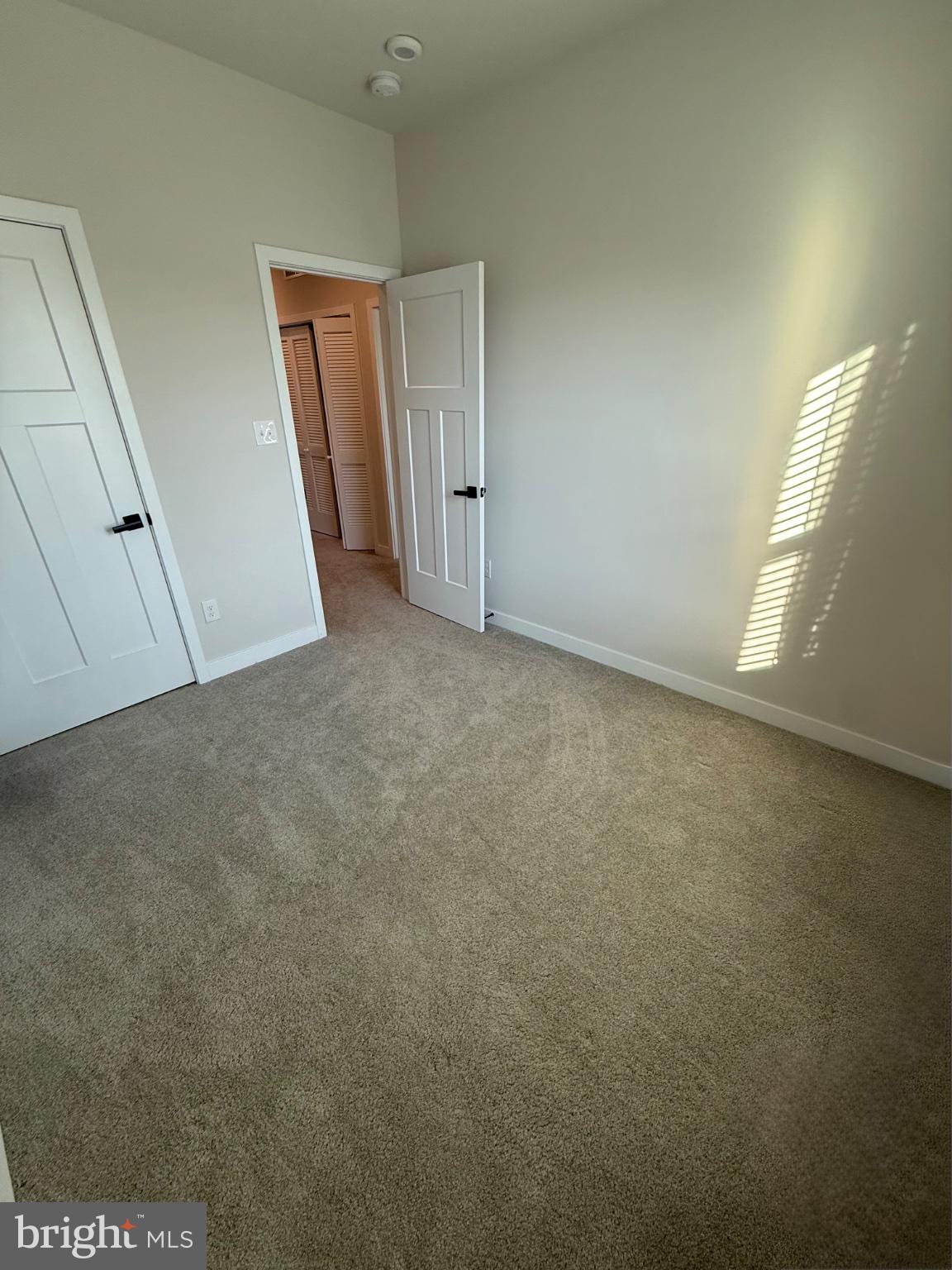 3 Cinnamon Lane Mount Laurel, NJ 08054 - Photo 18 of 27 an empty room with staircase and white walls