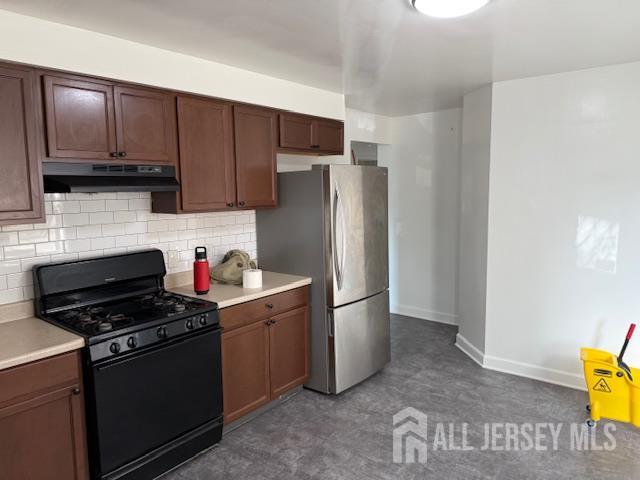 175 Madison Avenue Perth Amboy, NJ 08861 - Photo 12 of 13 a kitchen with stainless steel appliances a refrigerator stove and microwave