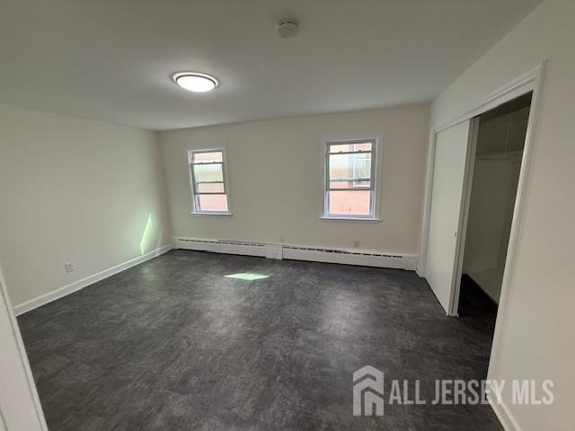 175 Madison Avenue Perth Amboy, NJ 08861 - Photo 6 of 13 an empty room with windows