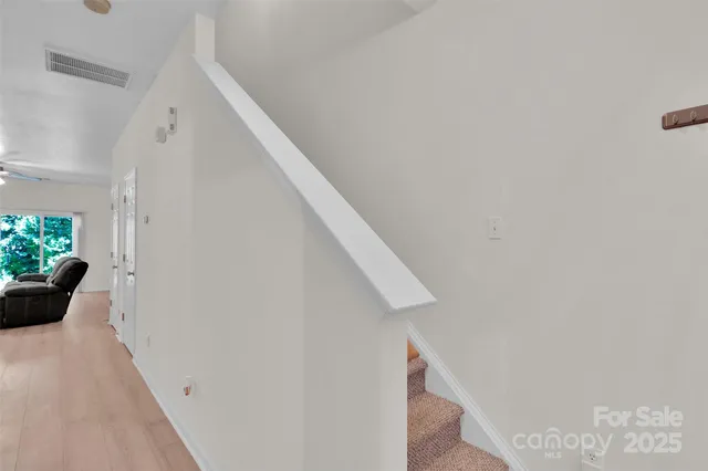 a view of entryway with stairs