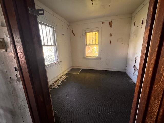709 Vermont Street Gary, IN 46402 - Photo 3 of 9 a view of empty room with windows