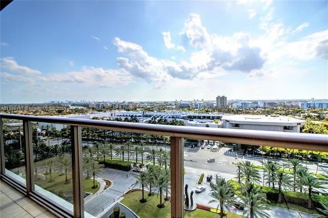 a view of a balcony with city view