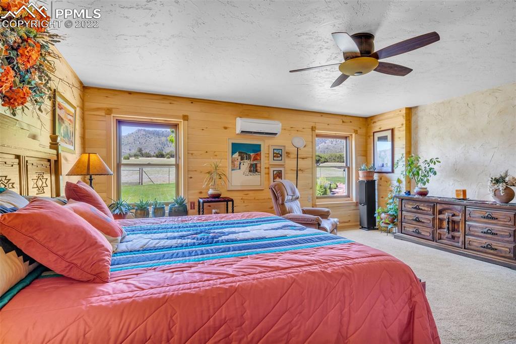 620 Crestview Drive Florence, CO 81226 - Photo 15 of 49 a bedroom with a bed and balcony view