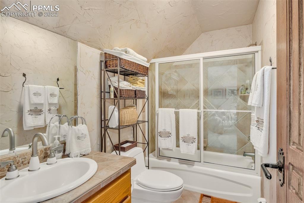 620 Crestview Drive Florence, CO 81226 - Photo 26 of 49 a bathroom with a sink toilet and shower