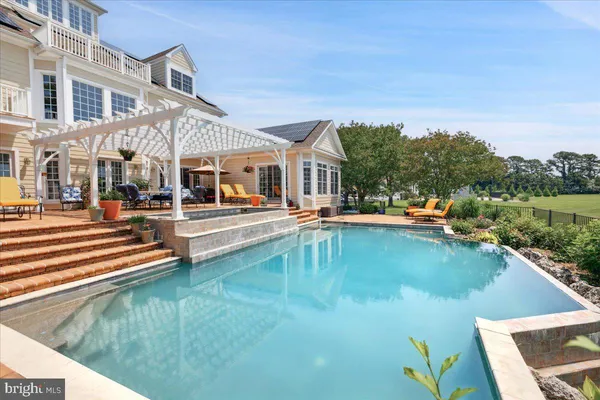 a bed room with furniture and a window