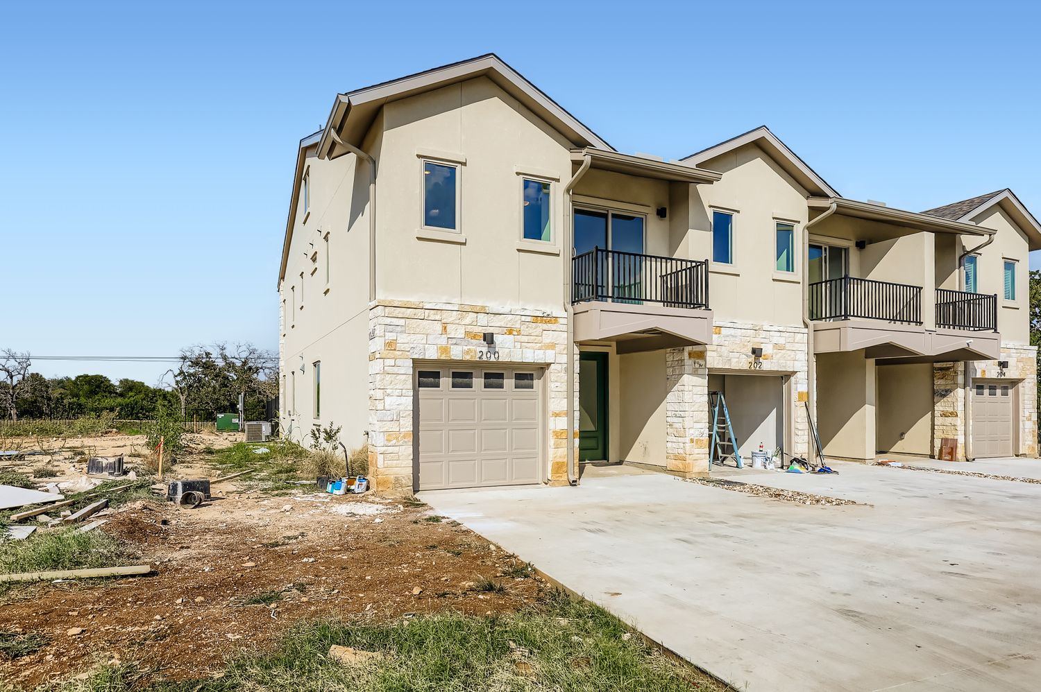 202 Tesla Circle Austin, TX 78681 - Photo 1 of 35 a view of a white house with a outdoor space