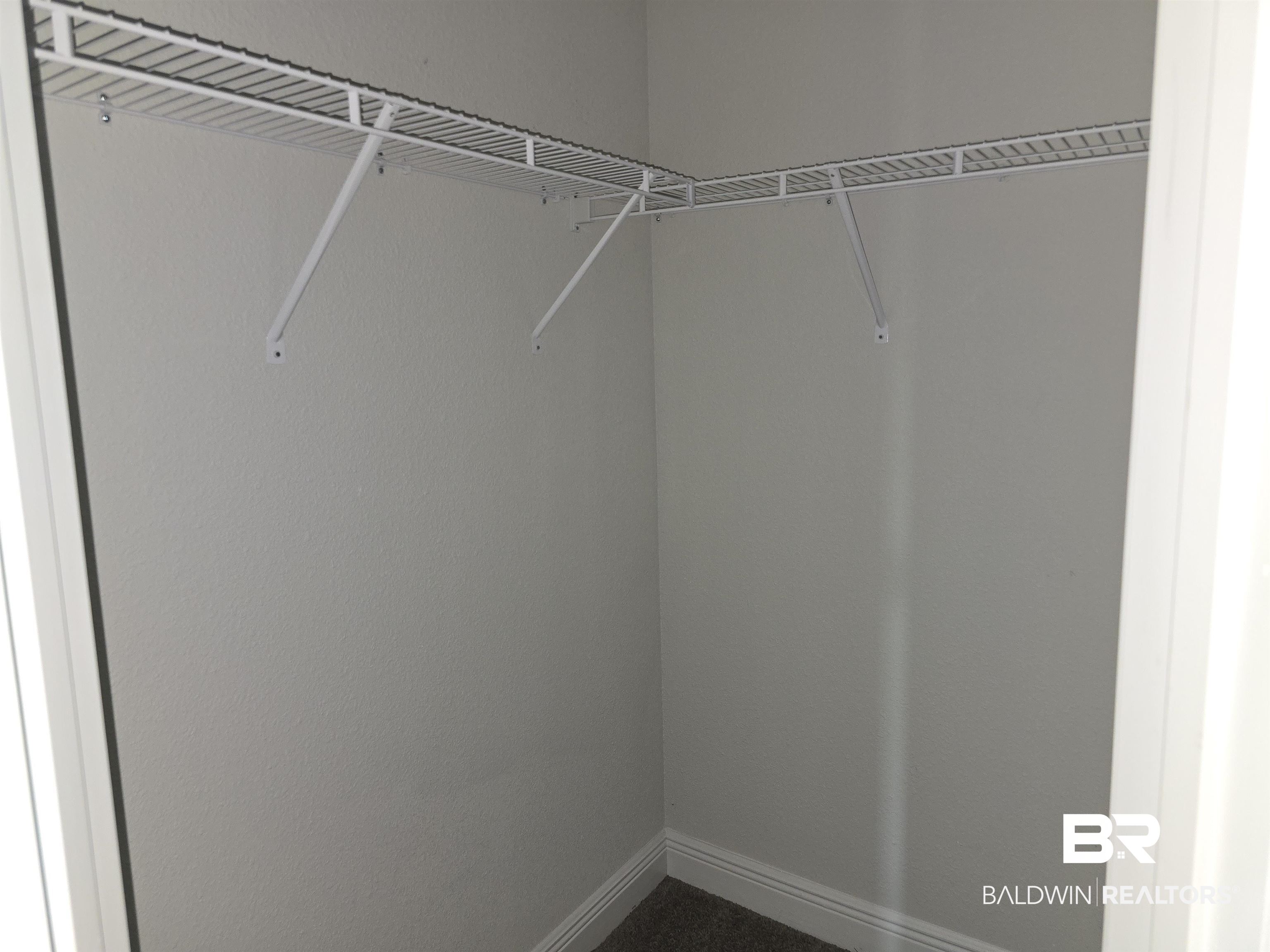 23035 Ridgewood Drive Robertsdale, AL 36567 - Photo 5 of 17 Master Closet 1