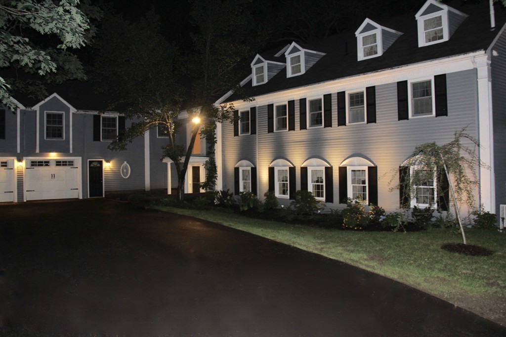 85 Schoolmasters Lane Dedham, MA 02026 - Photo 2 of 30 a view of a building with many windows