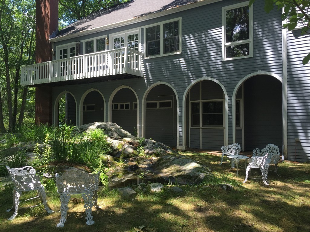 85 Schoolmasters Lane Dedham, MA 02026 - Photo 23 of 30 a front view of a house with garden