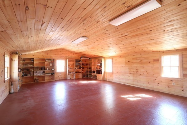 85 Schoolmasters Lane Dedham, MA 02026 - Photo 26 of 30 an empty room with wooden floor and windows