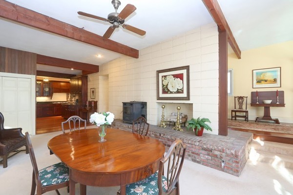 85 Schoolmasters Lane Dedham, MA 02026 - Photo 6 of 30 a dining room with furniture a fireplace and wooden floor