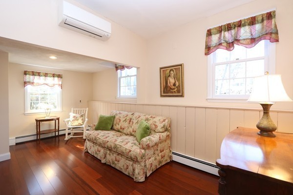 85 Schoolmasters Lane Dedham, MA 02026 - Photo 10 of 30 a living room with furniture and a wooden floor