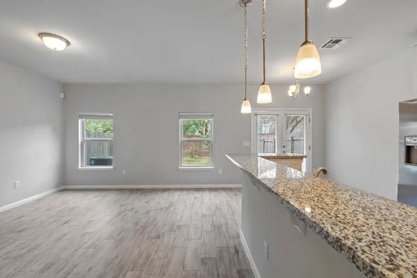 a view of a kitchen and window