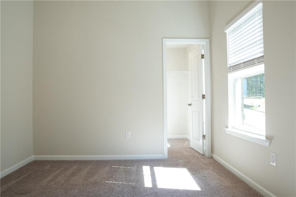 4545 Ajo Walk Atlanta, GA 30331 - Photo 16 of 28 an empty room with windows