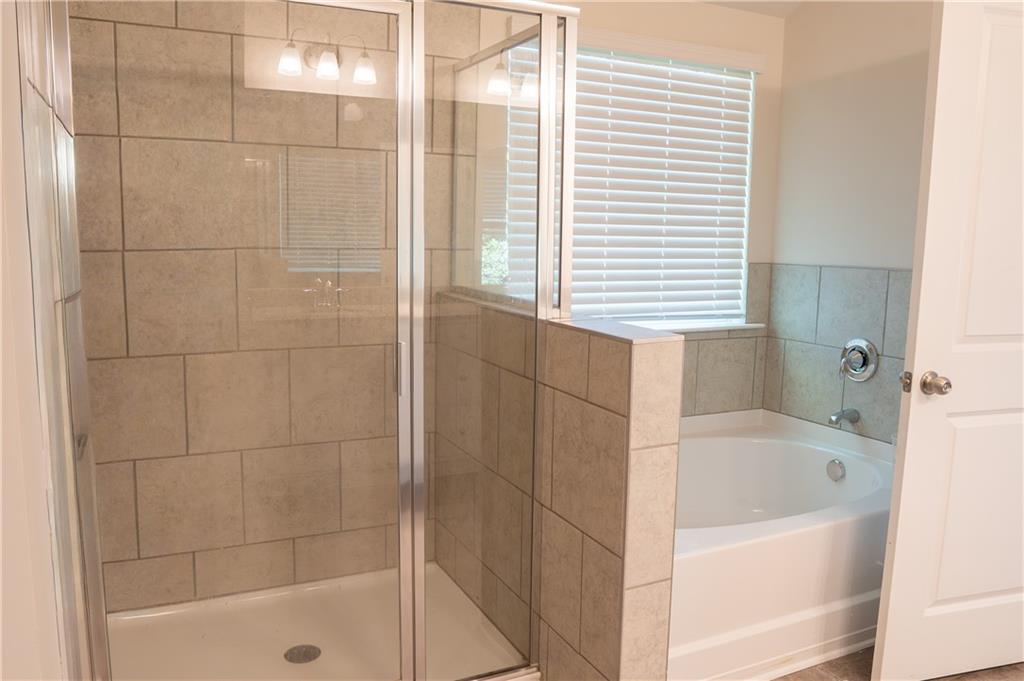 4545 Ajo Walk Atlanta, GA 30331 - Photo 24 of 28 a bathroom with a bathtub and shower