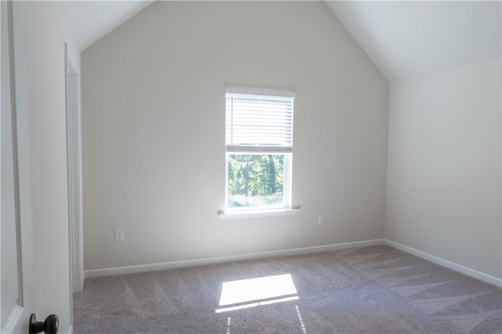4545 Ajo Walk Atlanta, GA 30331 - Photo 26 of 28 an empty room with a window