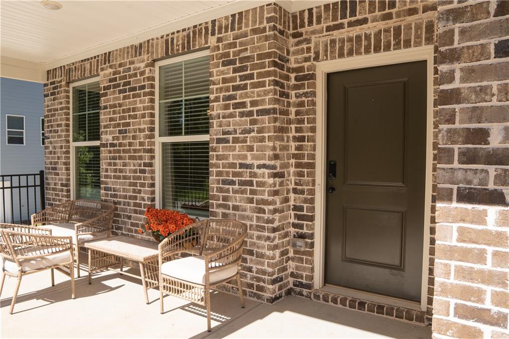 4545 Ajo Walk Atlanta, GA 30331 - Photo 5 of 28 a view of a door with a couple of chairs