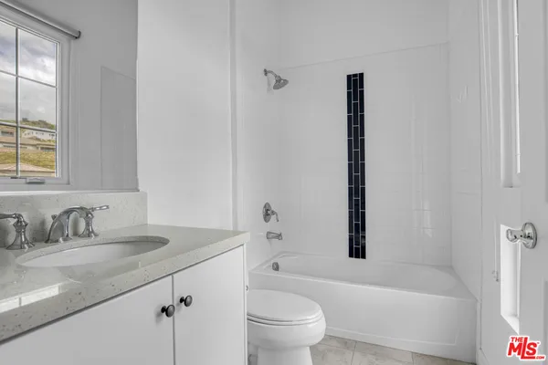 a view of a sink with mirror