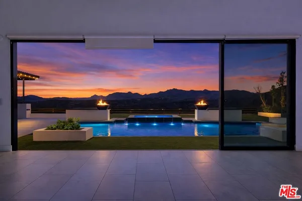 a view of livingroom with furniture and windows