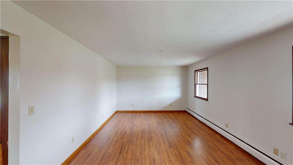 420 Sawmill Run Road Butler, PA 16001 - Photo 19 of 46 a view of a room with wooden floor and window