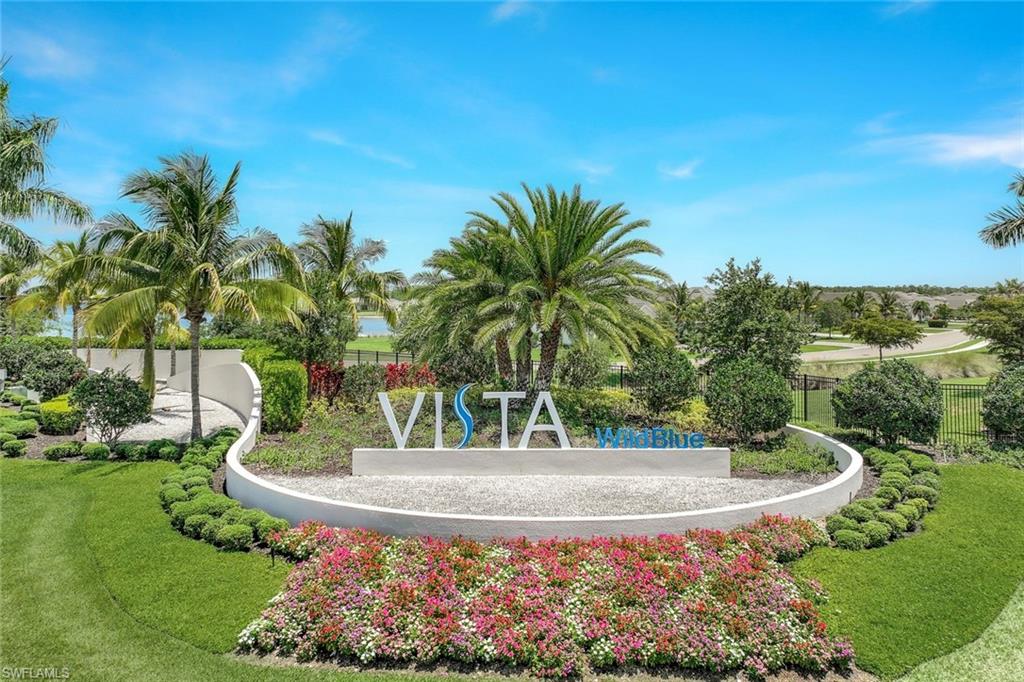 14630 Blue Bay Circle Fort Myers, FL 33913 - Photo 2 of 49 a view of a garden with a fountain