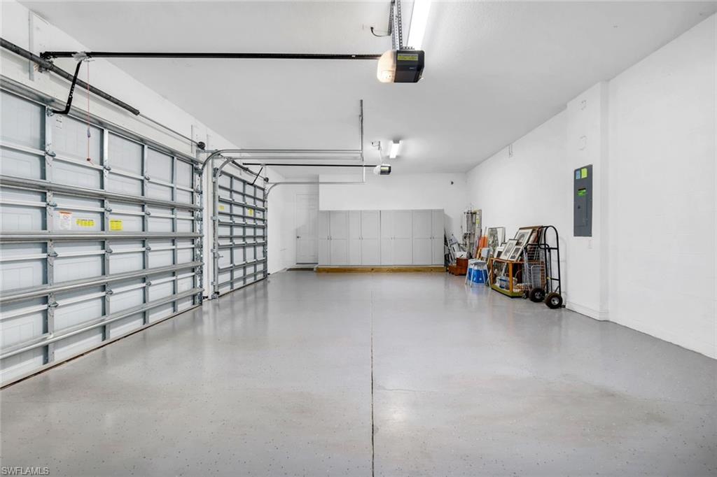 14630 Blue Bay Circle Fort Myers, FL 33913 - Photo 25 of 49 a view of a garage with stairs