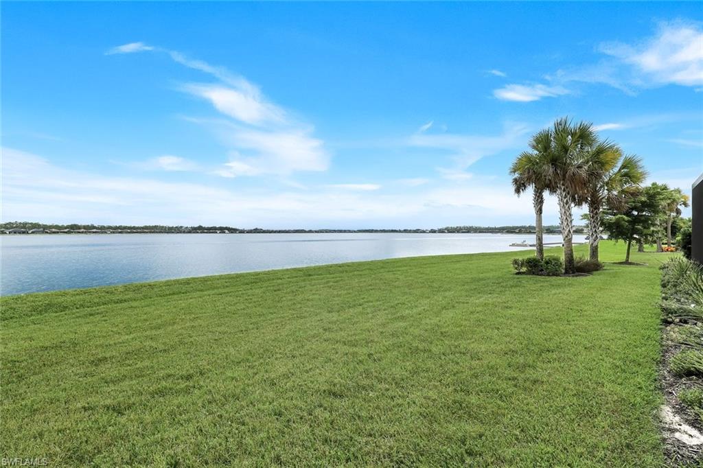 14630 Blue Bay Circle Fort Myers, FL 33913 - Photo 34 of 49 a view of a lake with a big yard