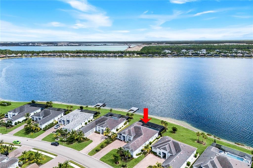 14630 Blue Bay Circle Fort Myers, FL 33913 - Photo 36 of 49 a view of a city and a mountain view in a lake