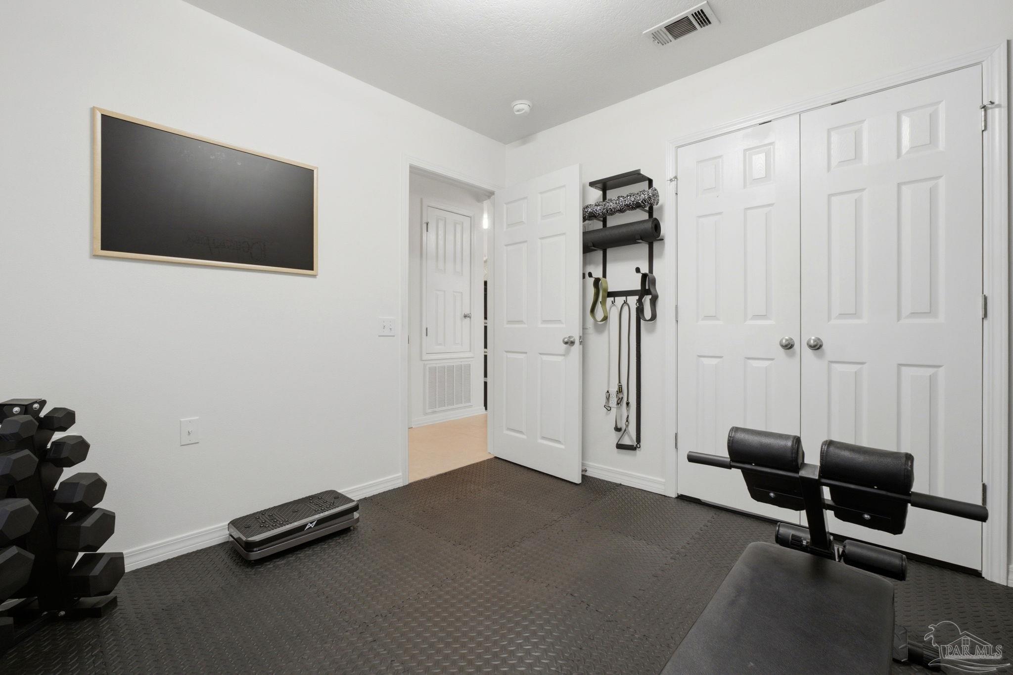 1237 Brownfield Road Pensacola, FL 32526 - Photo 7 of 30 a view of a livingroom with a flat screen tv