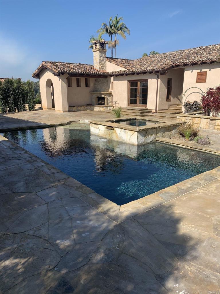 6858 Las Colinas Rancho Santa Fe, CA 92067 - Photo 16 of 23 a view of a house with a yard