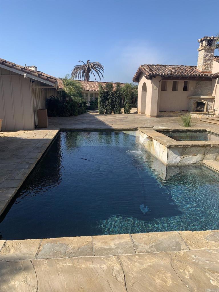 6858 Las Colinas Rancho Santa Fe, CA 92067 - Photo 17 of 23 a view of a swimming pool with an outdoor space and seating area