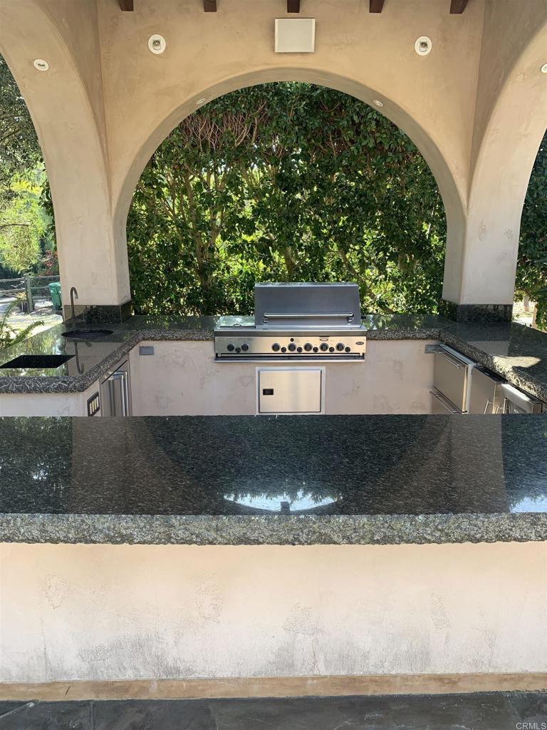 6858 Las Colinas Rancho Santa Fe, CA 92067 - Photo 18 of 23 a view of a swimming pool with an outdoor space