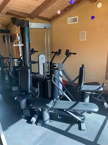 a view of a room with gym equipment