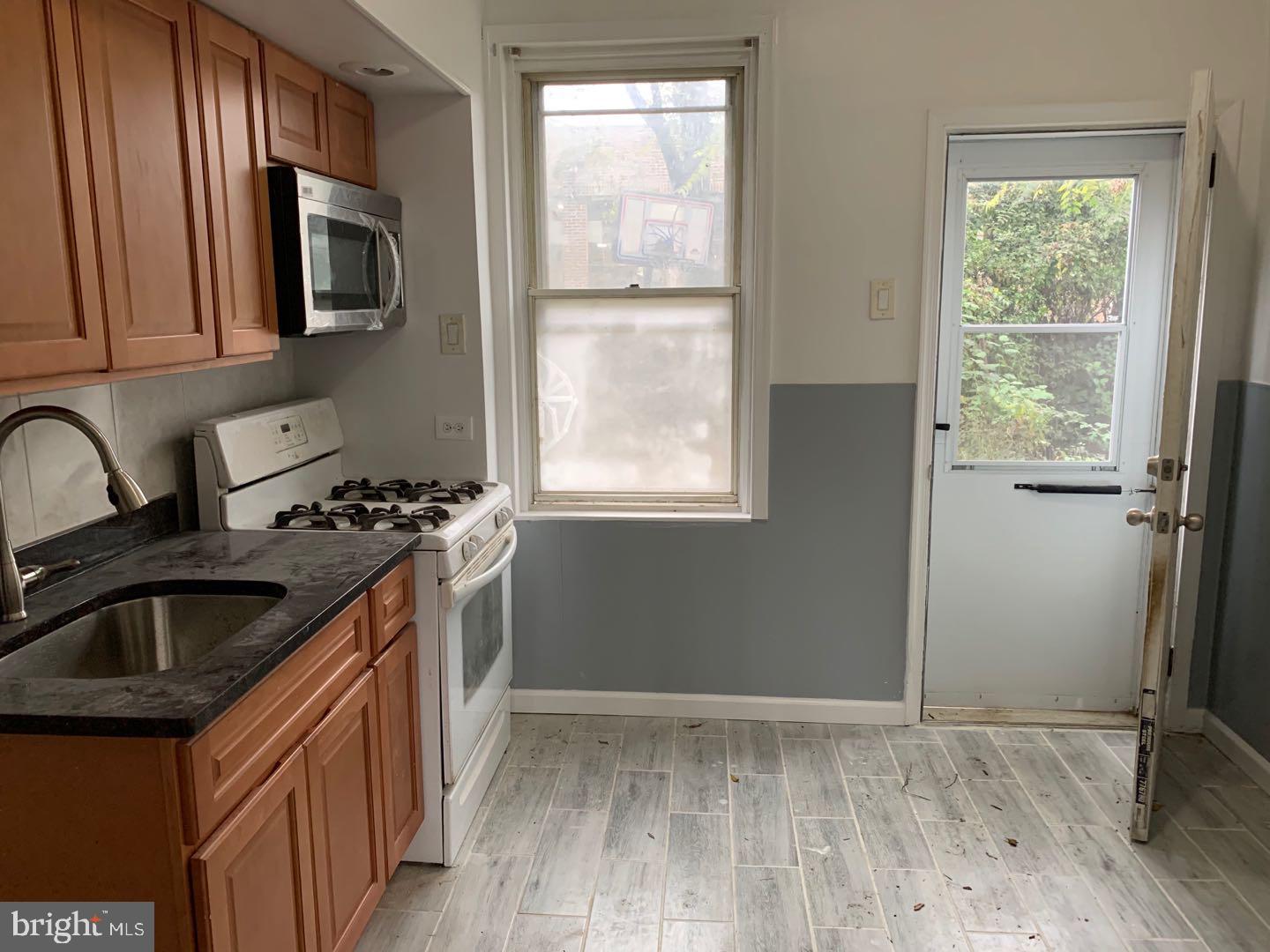 5734 Keystone Street Philadelphia, PA 19135 - Photo 8 of 12 Kitchen and backdoor