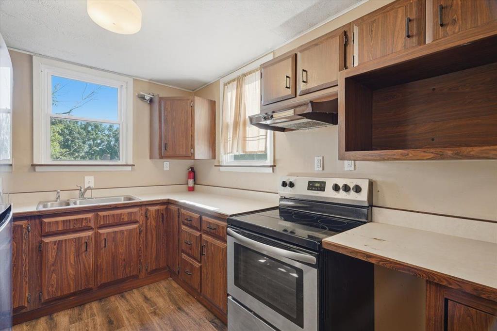 15 Division Street Pittsburgh, PA 15205 - Photo 24 of 44 a kitchen with a stove and a sink