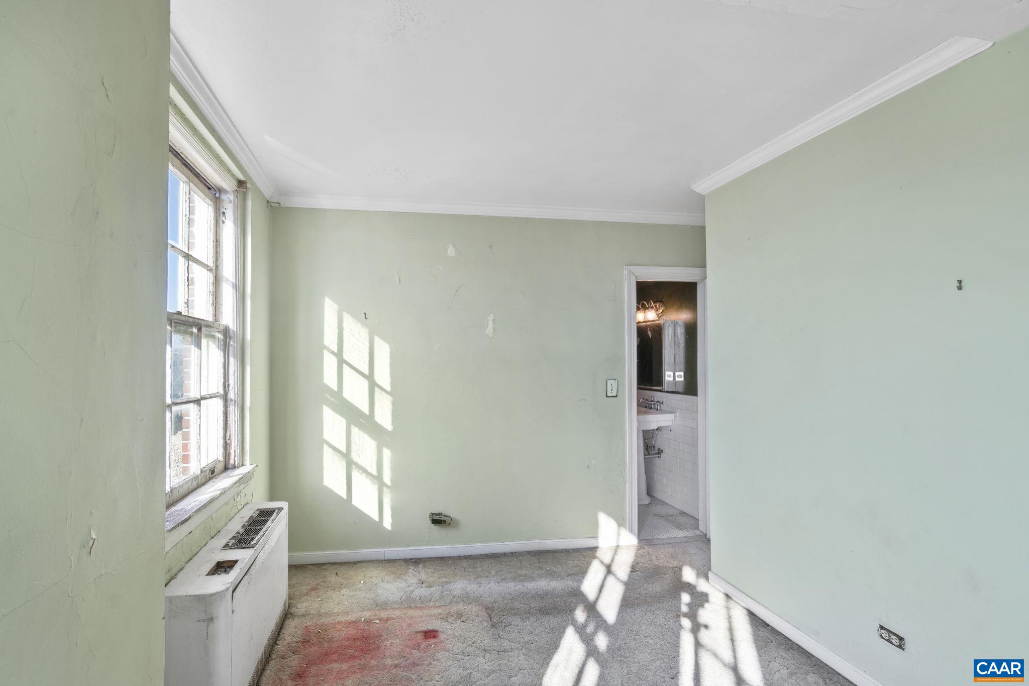 500 Court Square, Unit 406 Charlottesville, VA 22902 - Photo 12 of 20 a view of livingroom with window