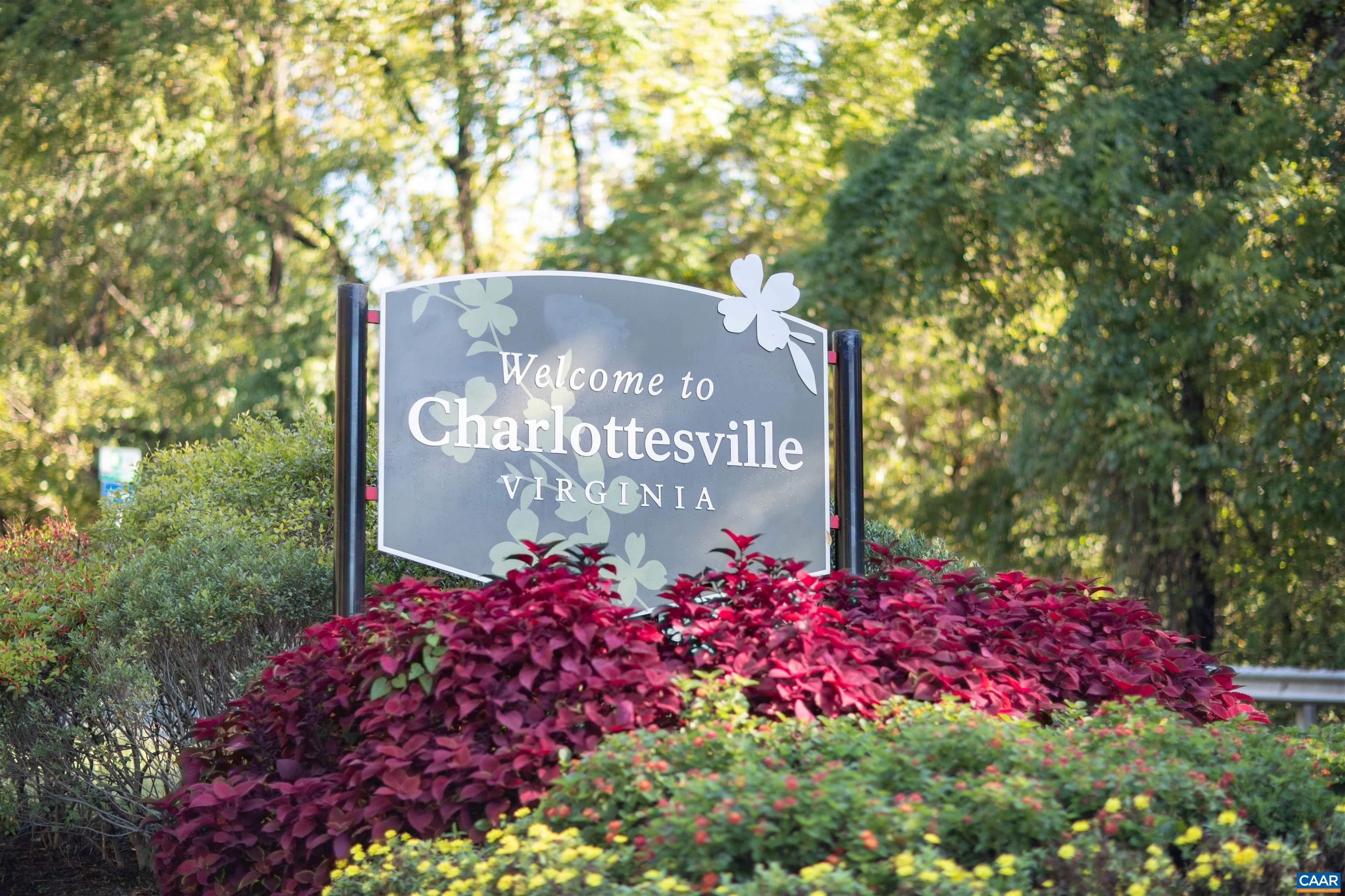 500 Court Square, Unit 406 Charlottesville, VA 22902 - Photo 19 of 20 a sign that is sitting in front of flowers