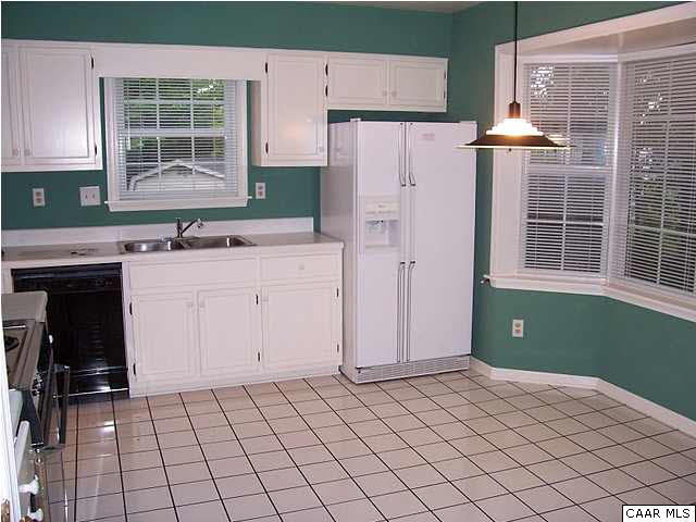 837 Harris Road Charlottesville, VA 22902 - Photo 8 of 20 a kitchen with a cabinets and window