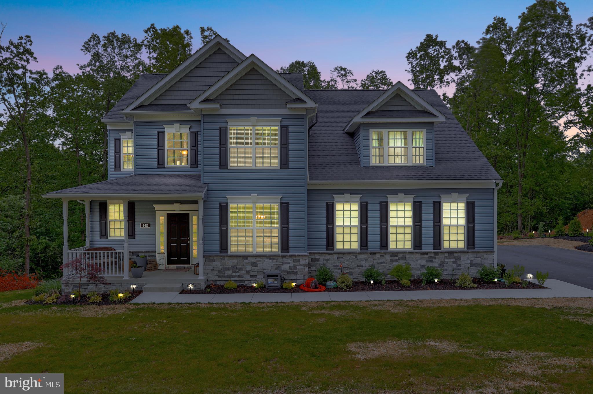448 Underwood Drive Falling Waters, WV 25419 - Photo 3 of 55 Twilight View; Welcoming & Beautiful
