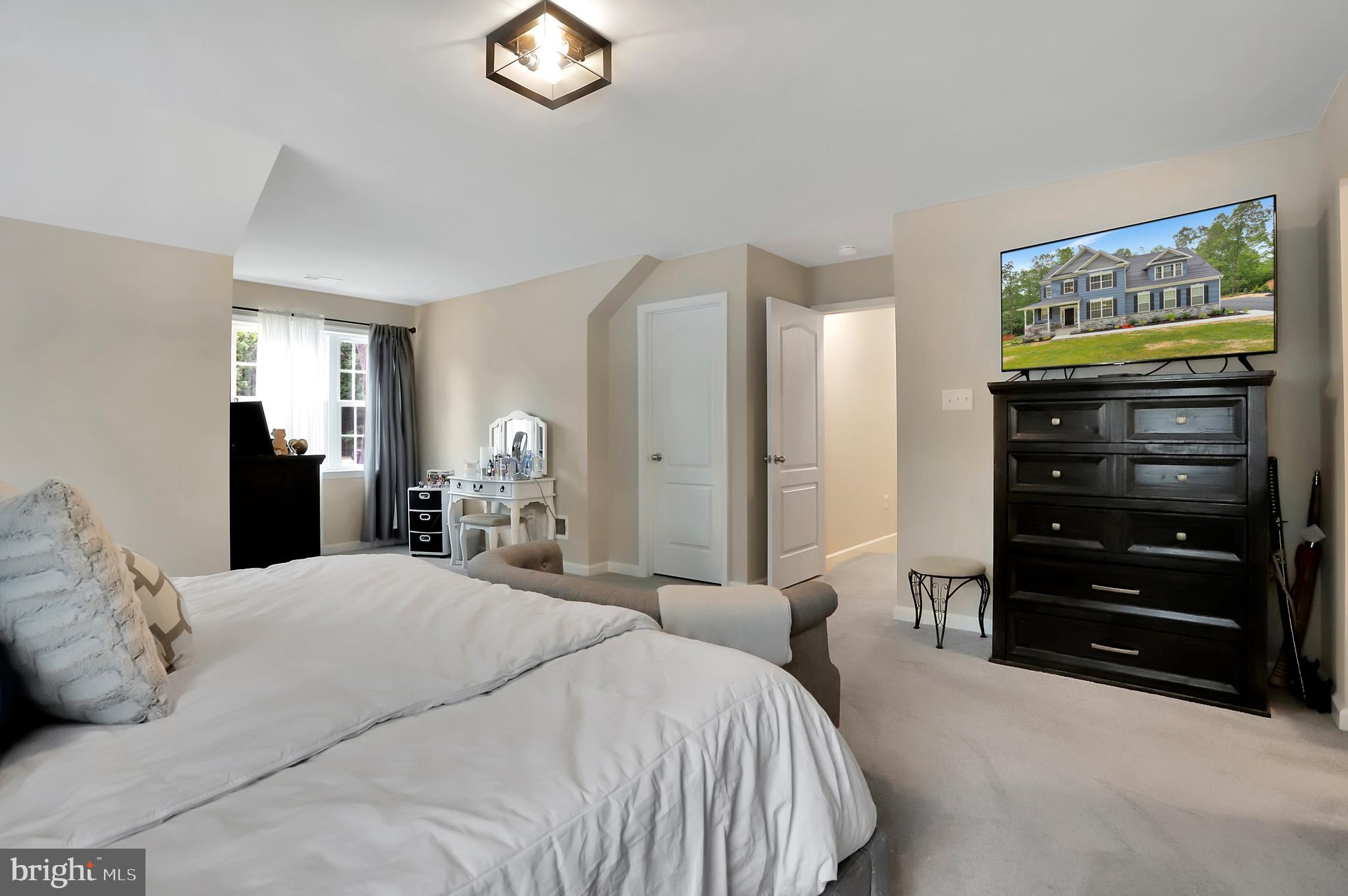 448 Underwood Drive Falling Waters, WV 25419 - Photo 28 of 55 Main 2nd Floor Master Bedroom w/ Sitting Area