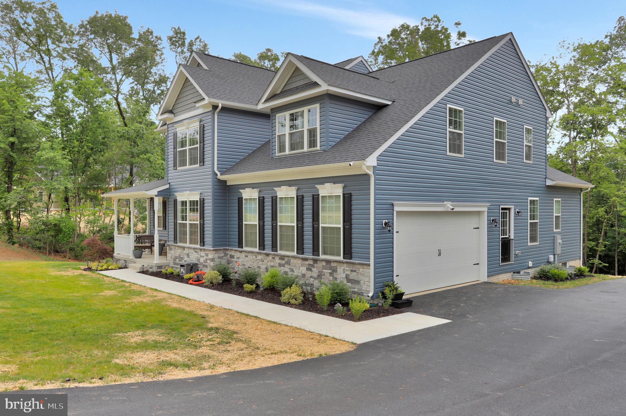 448 Underwood Drive Falling Waters, WV 25419 - Photo 45 of 55 (2) Car Garage; Exterior Side View